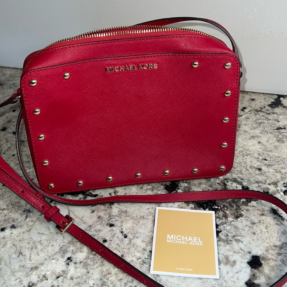Michael Kor’s Red Studded Crossbody Bag